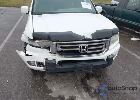 2012 Honda Ridgeline Rtl z USA, uszkodzony, nr VIN 5FPYK1F57CB002654